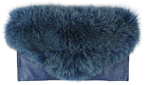 A beautiful small handbag made of genuine leather and fox fur