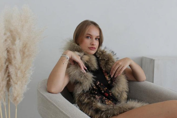 A beautiful scarf with floral patterns and natural fur accents