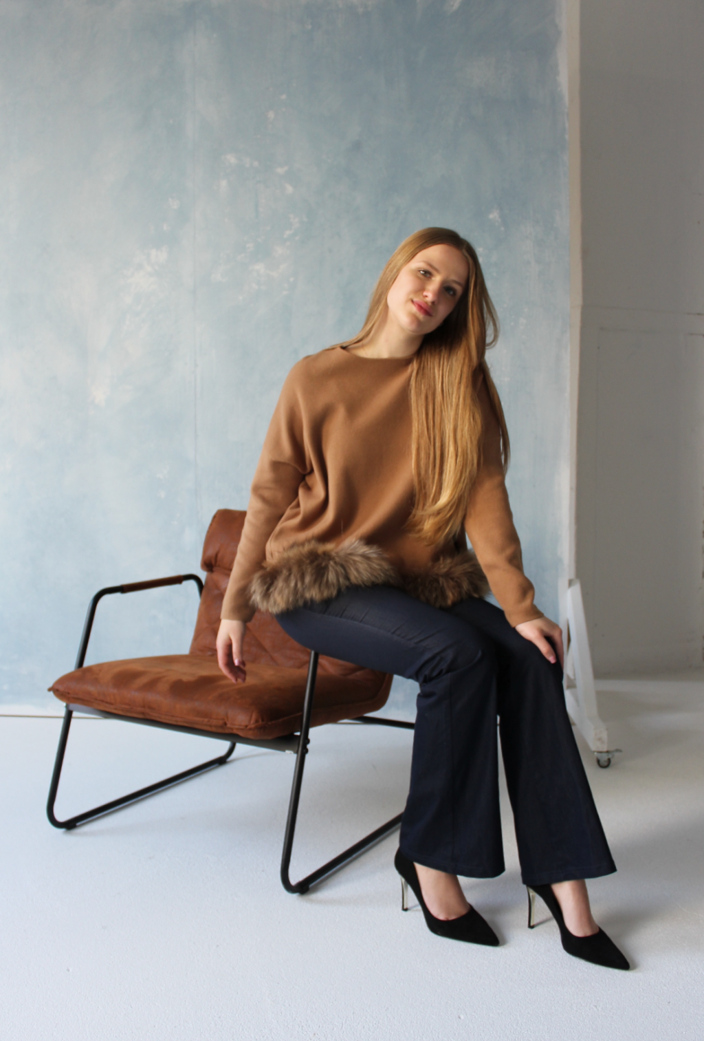 Exclusive women's sweater with natural fur