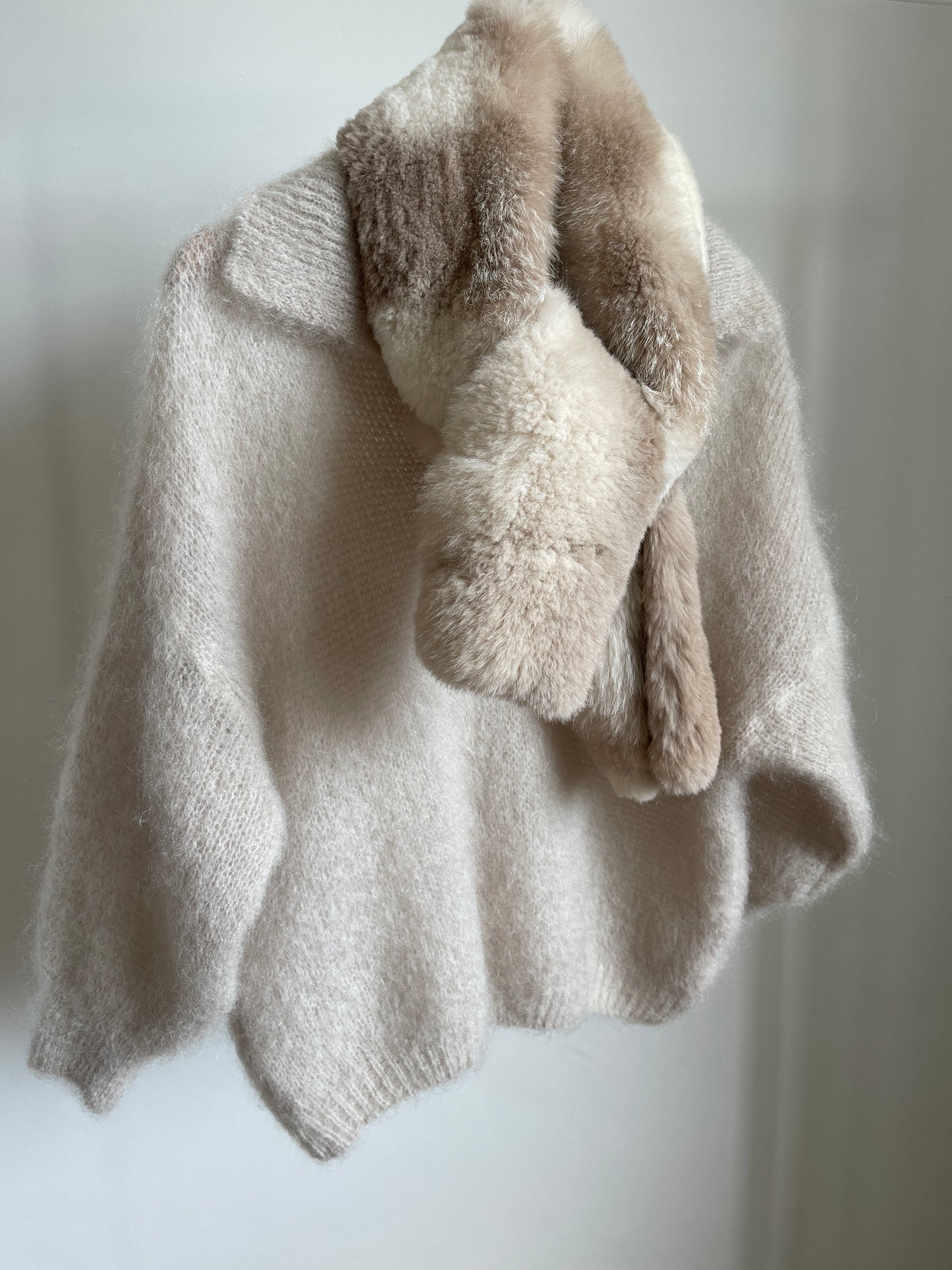 Warm the creamy colour woman sweater