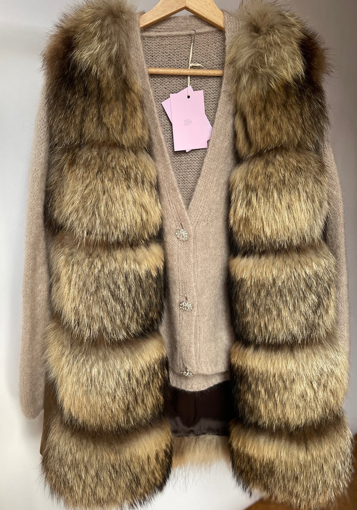 Stylish vintage - style natural fur vest with genuine leather inserts