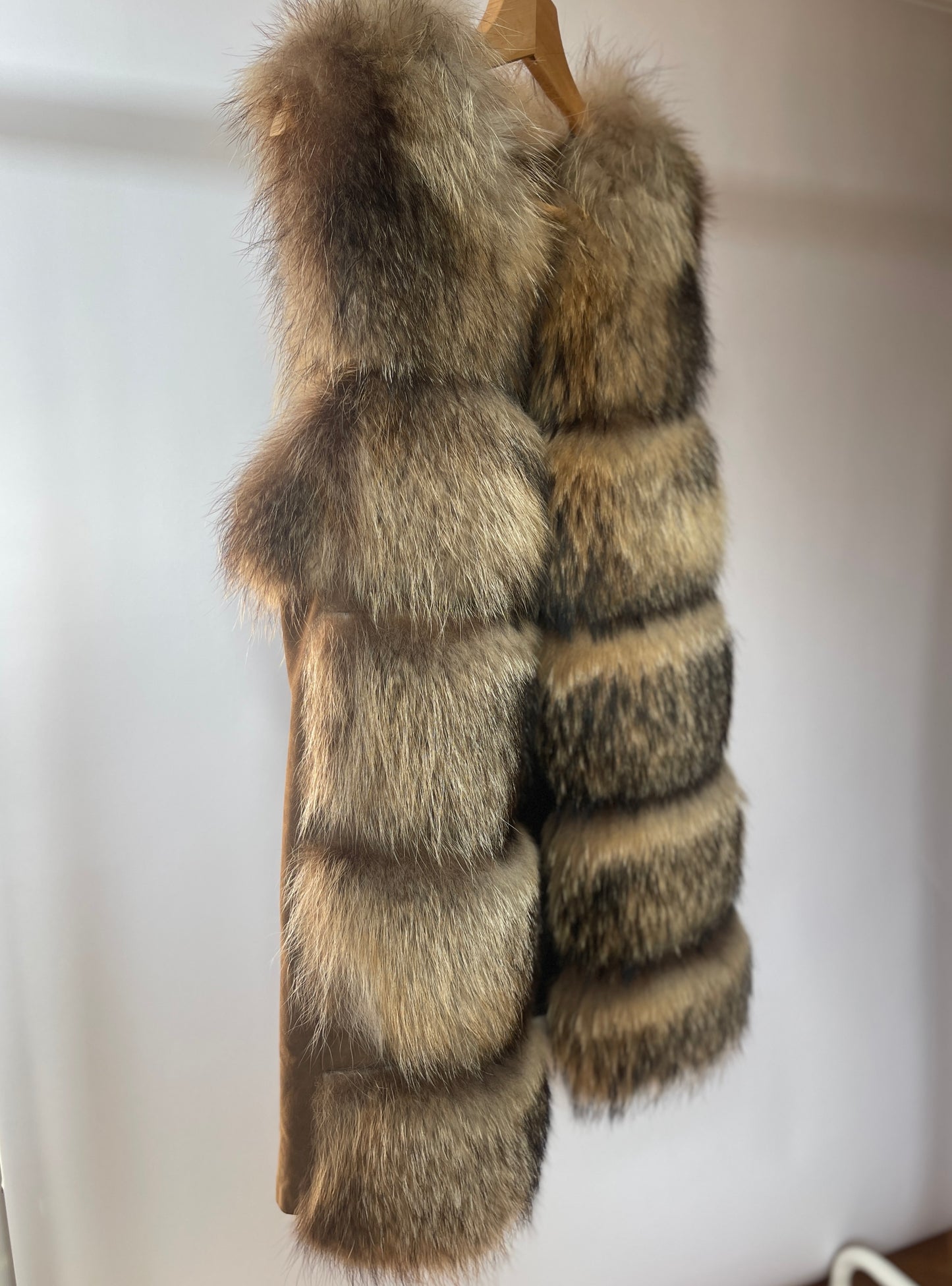 Stylish vintage - style natural fur vest with genuine leather inserts