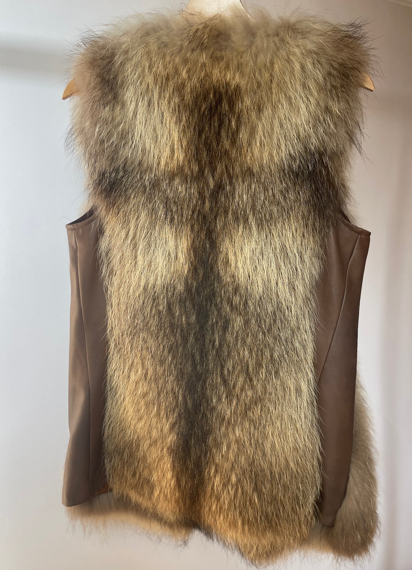 Vintage style raccoon dog vest with genuine leather inserts on the sides