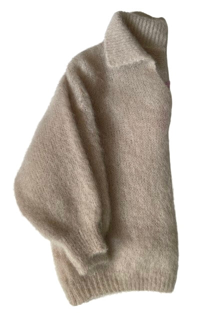 Warm the creamy colour woman sweater