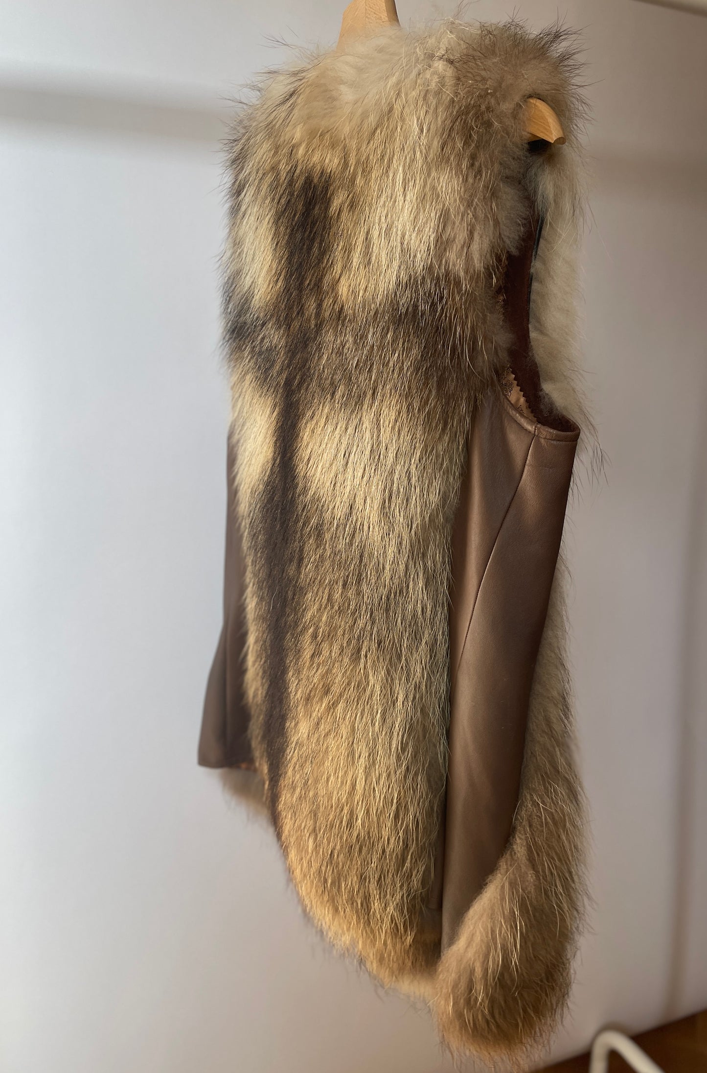 Vintage style raccoon dog vest with genuine leather inserts on the sides